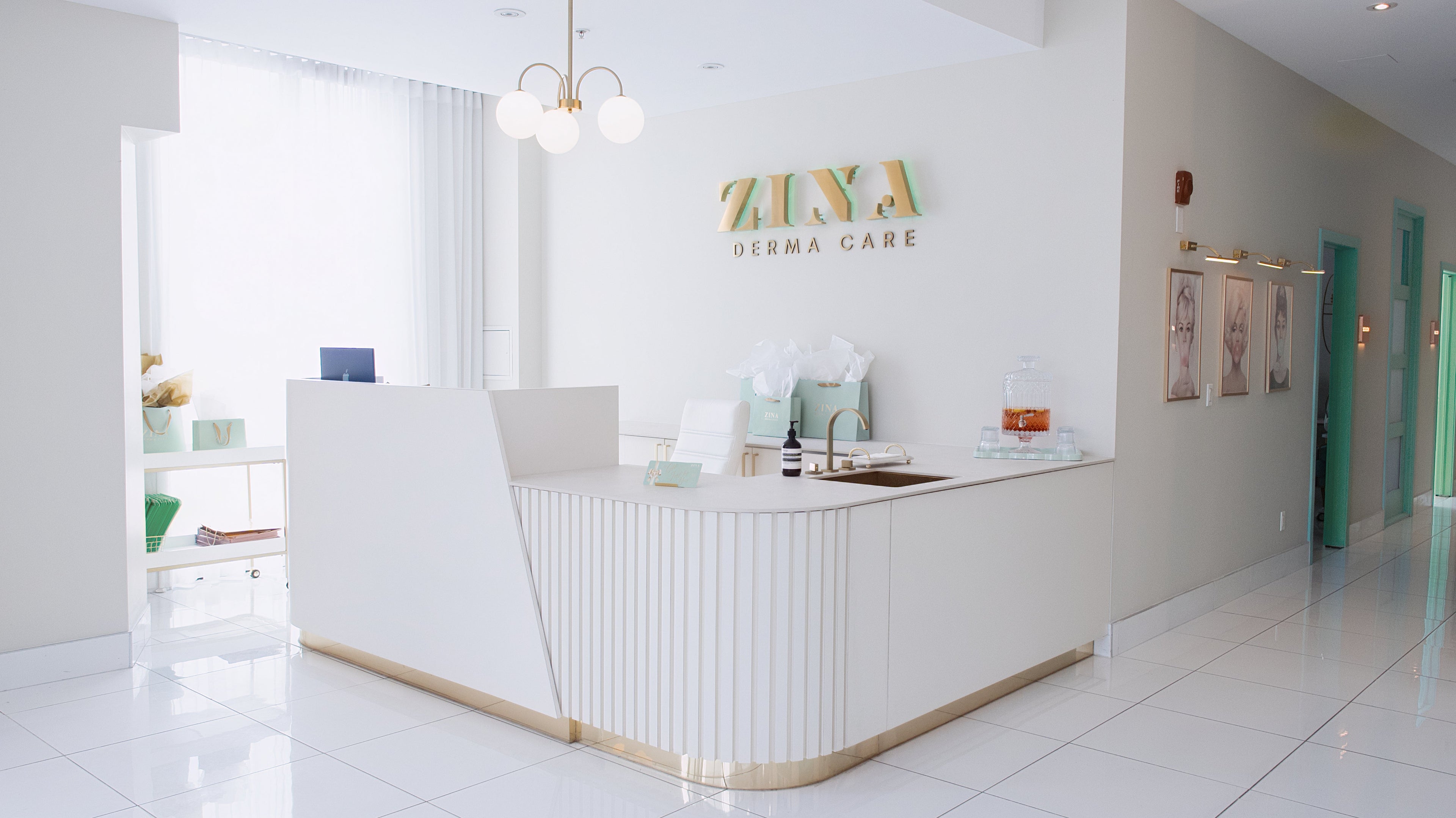 Modern interior of a clinic with a reception desk and 'Ziya' branding.